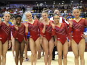 New world champions Team USA with Simone Biles, Kara Eaker, Morgan Hurd, Ragan Smith, Grace Mc Callum and Riley Mc Cusker celebrate after the women’s team final of the Gymnastics World Chamionships at the Aspire Dome in Doha, Qatar, Tuesday, Oct. 30, 2018.