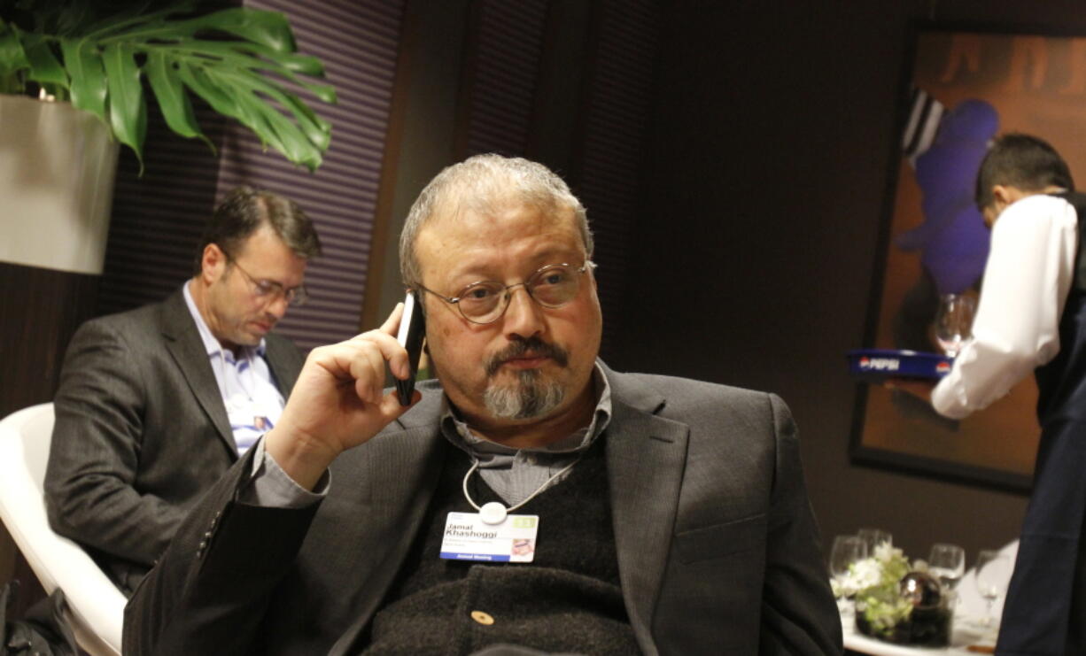 Saudi Arabian journalist Jamal Khashoggi speaks on his cellphone at the World Economic Forum in Davos, Switzerland. The Washington Post said Wednesday, Oct. 3, 2018, it was concerned for the safety of Khashoggi, a columnist for the newspaper, after he apparently went missing after going to the Saudi Consulate in Istanbul.