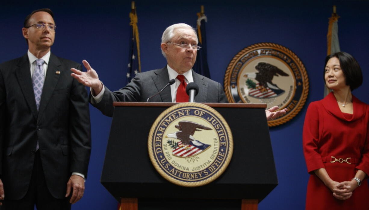 Attorney General Jeff Sessions, joined by Deputy Attorney General Rod Rosenstein, left, and Jessie Liu, U.S. Attorney for the District of Columbia, right, speaks during a news conference at the U.S. Attorney’s Office for the District of Columbia in Washington on Monday to announce on efforts to reduce transnational crime.