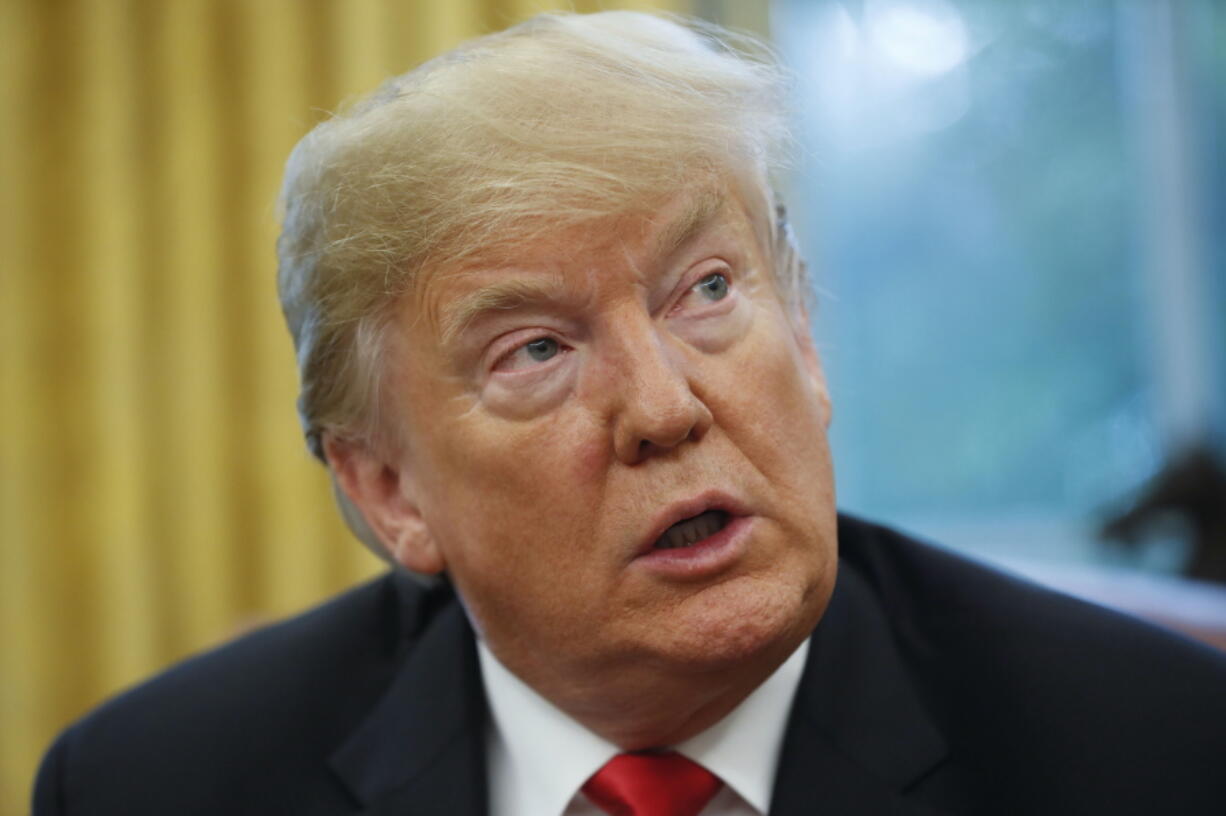 President Donald Trump speaks during his meeting to discuss potential damage from Hurricane Michael, in the Oval Office of the White House in Washington, Wednesday, Oct. 10, 2018.