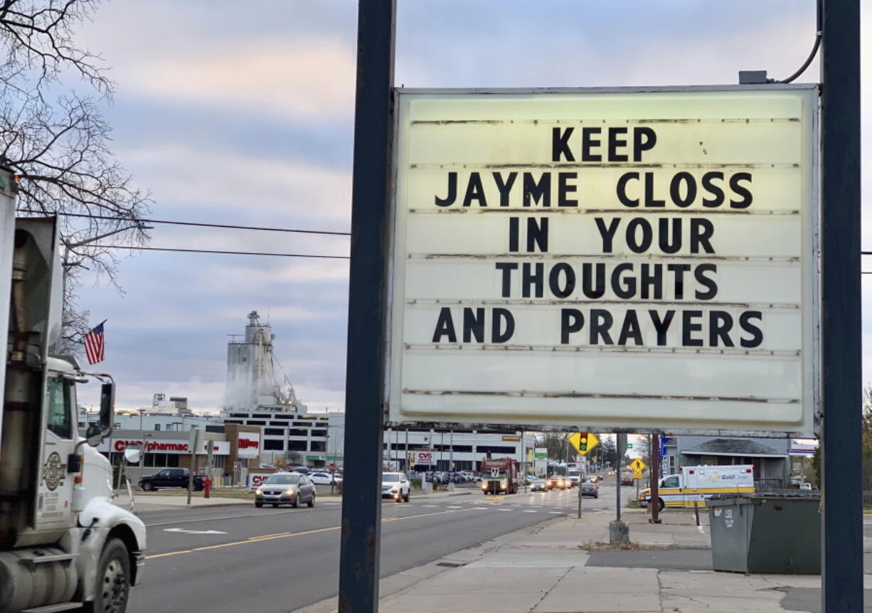 A sign is seen in the small town of Barron, Wis., on Tuesday where 13-year-old Jayme Closs was discovered missing Oct. 15 after her parents were found fatally shot at their home. A search was being organized to find the couple’s missing daughter.