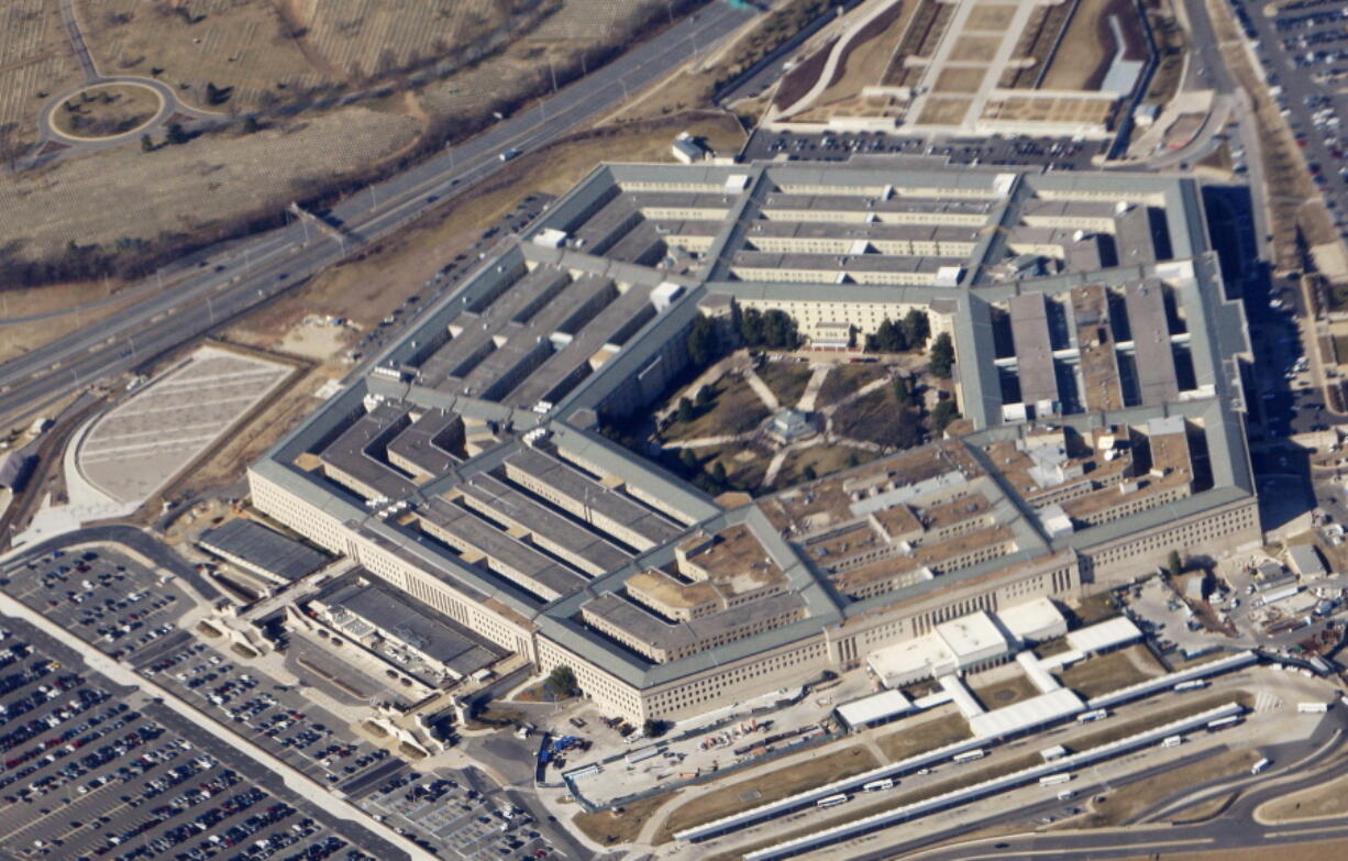 The Pentagon is seen from Air Force One. The Pentagon says the U.S. is offering to put its cyber-warfare capabilities to use on behalf of its NATO allies. Officials planned to announce it in the coming days as U.S. Defense Secretary Jim Mattis attends a meeting of NATO defense ministers in Brussels on Wednesday and Thursday.