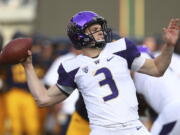 Washington quarterback Jake Browning (3) passes against California during the first half of an NCAA college football game Saturday, Oct. 27, 2018, in Berkeley, Calif.