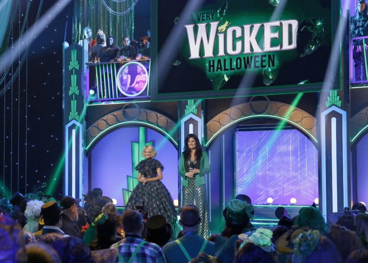 Kristin Chenoweth, left, and Idina Menzel from the Halloween-themed TV special “A Very Wicked Halloween: Celebrating 15 Years on Broadway,” airing at 10 p.m. Monday on NBC. Chenoweth and Menzel were original stars of the Broadway production.