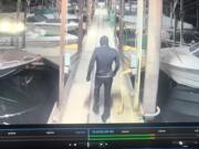 The wetsuit wearing suspect in a Sept. 9 boat theft at the Port of Camas-Washougal entered the locked marina from private property to the west, according to the facilities manager.