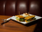 The SLAB.L.T. sandwich with potato salad at Shelby’s Grille in Washougal.