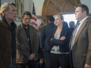 Robert Taylor as Walt Longmire, from left, Lou Diamond Phillips as Henry Standing Bear, Katee Sackhoff as Vic Moretti and Adam Bartley as Deputy Archie “Ferg” Ferguson in “Longmire.” Lewis Jacobs/Netflix/