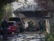 Firefighters battle a blaze at 3711 Northeast 100th Circle south of Salmon Creek on Monday morning, Nov. 12, 2018. No injuries were reported in the fire.