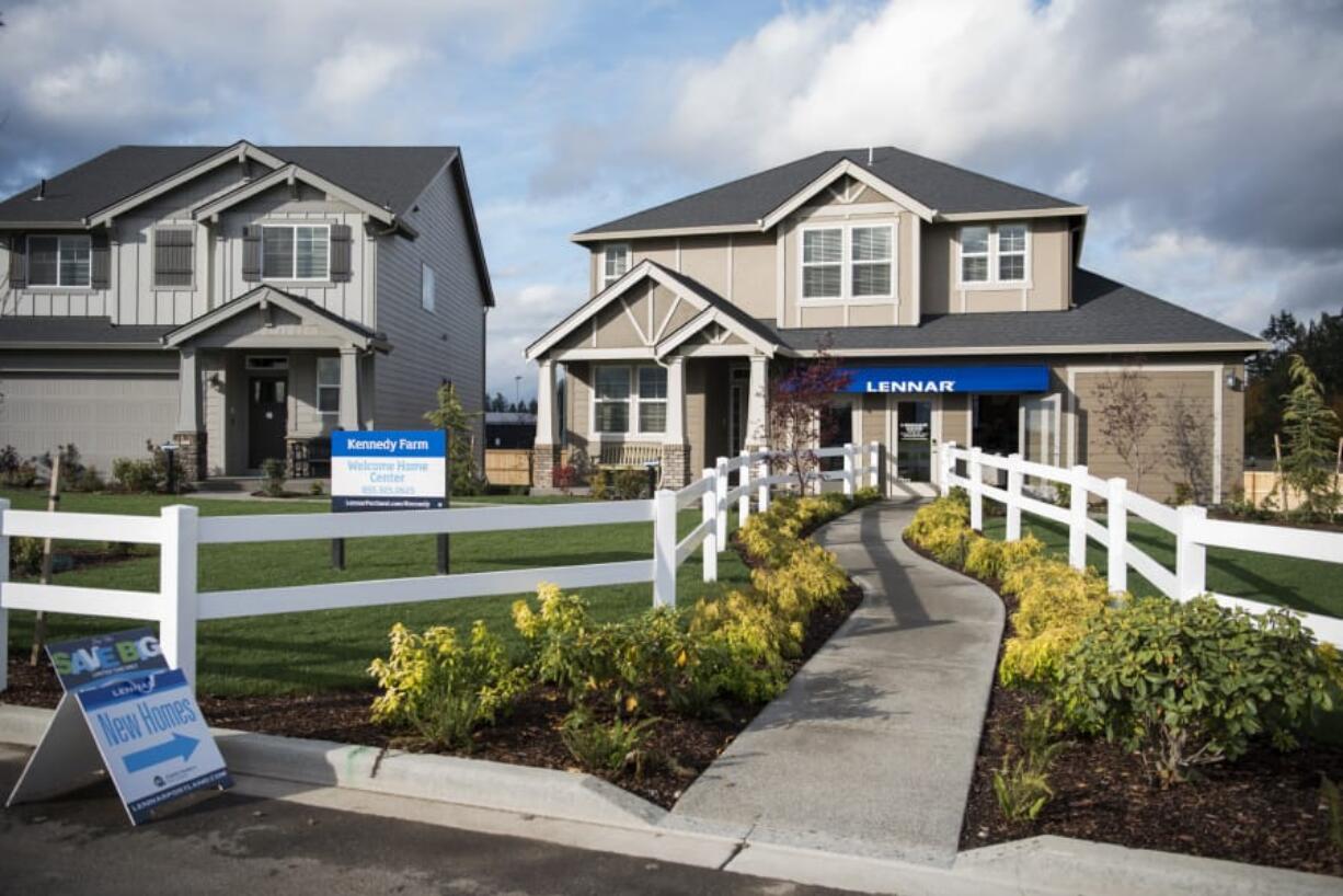 Lennar Homes homes, like this one in the Kennedy Farm subdivision in Ridgefield, come with built-in wireless access points and automated technology such as thermostat, music, lighting, entertainment and security control.