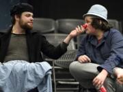 Senior Samuel Edmundson, left, gives an affectionate nose-honk to his brother, eighth-grader Joseph Edmundson, during a break in dress rehearsal.