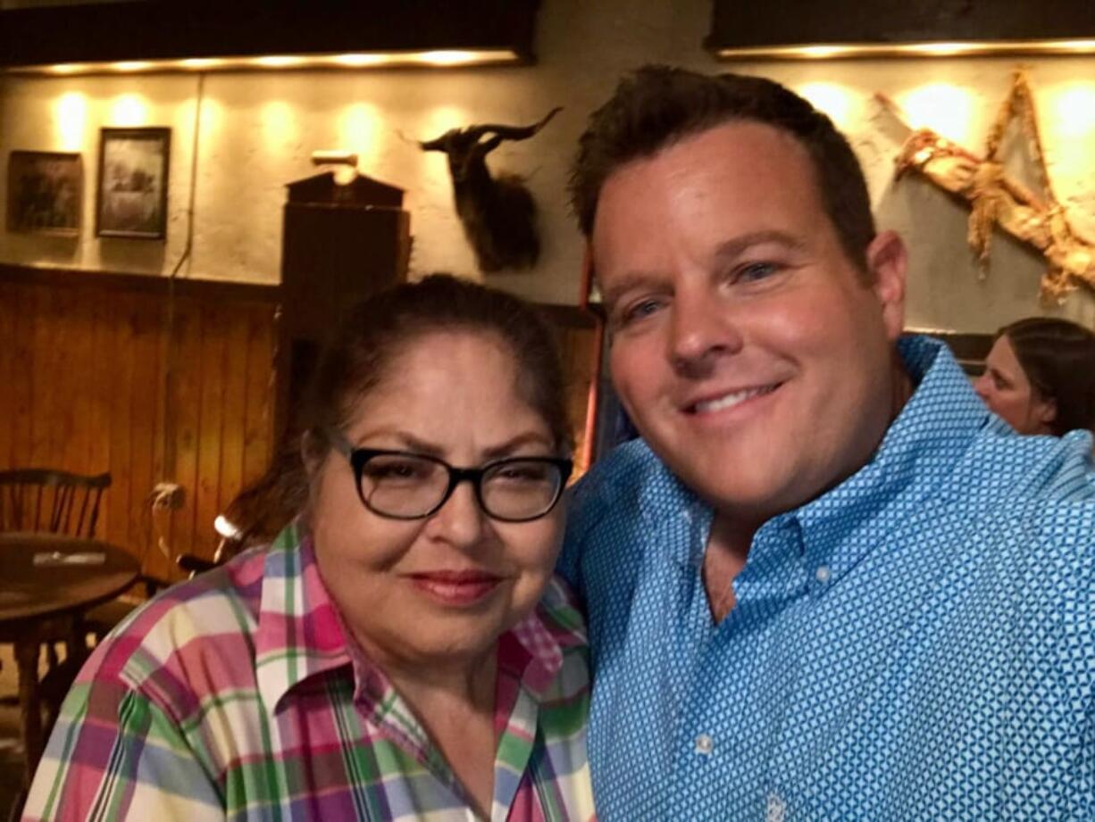 Vancouver resident Pamela Nordick, left, and her nephew, actor Adam (“The Ferg”) Bartley on the set during the making of the final episode of “Longmire.” Nordick, a superfan of both the “Longmire” books and TV show, said Bartley went to some trouble to make sure his aunt was visible onscreen during the scene they shot.