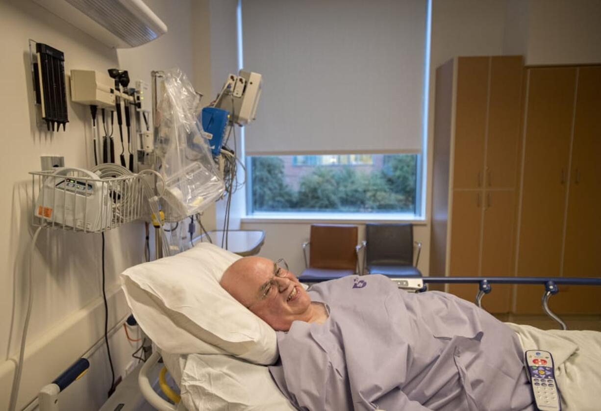 Dana Pearson of Battle Ground greets staff at Legacy Salmon Creek Medical Center with a smile before having his fourth full joint replacement of this year. Pearson, who has bad genes, had his right hip replaced in January, left hip in April, left knee in August and right knee on Halloween.