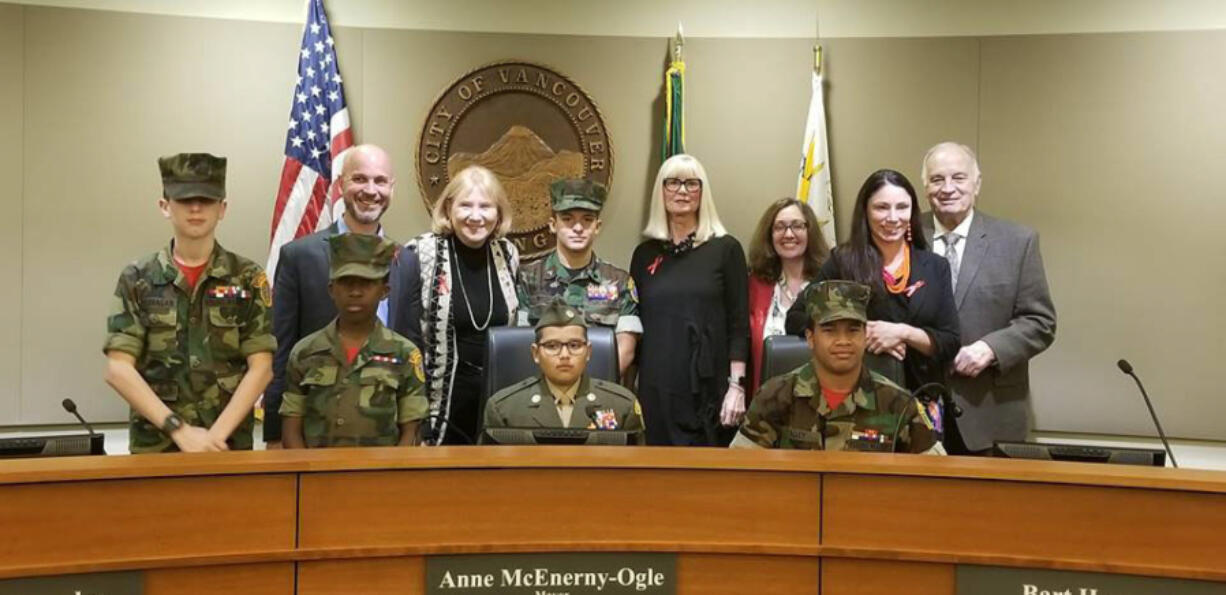 Esther Short: As part of Red Ribbon Week, a nationwide anti-drug campaign, Vancouver Mayor Anne McEnerny-Ogle and the Vancouver City Council honored the Lewis & Clark Young Marines, from left: Pvt. Spencer Flanagan, Pvt. Cameran Veal, Cpl. Kyle Borneman, seated, Cpl. Victor Wright, standing in back, and Pvt. Paul Talley.