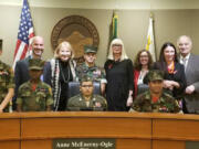 Esther Short: As part of Red Ribbon Week, a nationwide anti-drug campaign, Vancouver Mayor Anne McEnerny-Ogle and the Vancouver City Council honored the Lewis & Clark Young Marines, from left: Pvt. Spencer Flanagan, Pvt. Cameran Veal, Cpl. Kyle Borneman, seated, Cpl. Victor Wright, standing in back, and Pvt. Paul Talley.