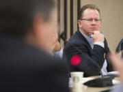 Superintendent of Public Instruction Chris Reykdal listens to a member of the Washington State Board of Education speak in 2018 at Educational Service District 112 in Vancouver.