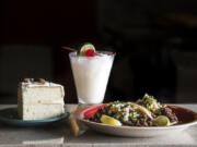 Old Fashion Almond Cake, a Lime in the Coconut cocktail and carne asada tacos are seen here at Provecho on Thursday afternoon, Nov. 8, 2018.