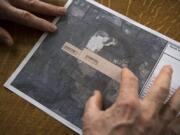 Gary Ogier looks at a map of proposed overlay near the Yacolt Mountain Quarry that has him and other neighbors concerned.