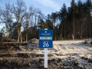 A sign adverting an available homesite is seen here at the Amberglen development on Monday afternoon, Nov. 12, 2018.