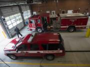 Fire crews return to Vancouver Fire Station 2 after responding to a call.