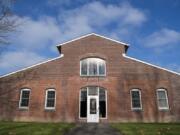 The red brick building on the Northwest corner of East Fifth Street and Fort Vancouver Way was built as a mule barn, but it stands on what was originally the site of the first-ever church in Clark County, St. James. Workers at the Hudson’s Bay Company celebrated Vancouver’s first formal Christmas service in 1838, and the church opened six years later. The site is pictured on Nov. 15, at the Fort Vancouver National Historic Site.