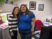 Clark College scholarships specialist Lizette Drennan, left, visits with Esmeralda “Vita” Blanco at Drennan’s office at Gaiser Hall. Drennan has helped Blanco with many scholarship applications over the years.