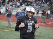 Union quarterback Lincoln Victor scores against Puyallup.