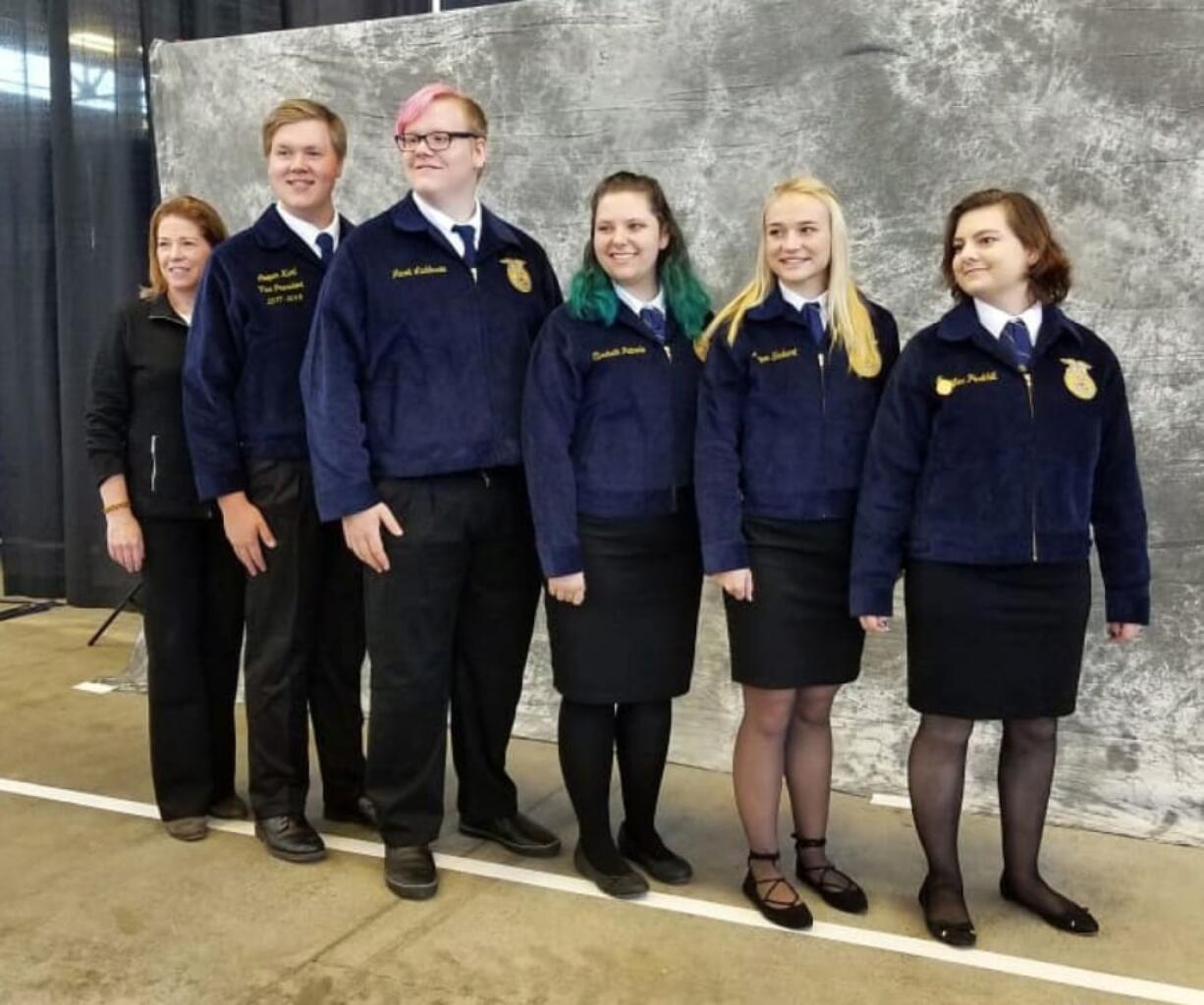 Woodland: Chapter coach Mary Ellen Vetter, from left, Cooper Kaml, Jacob Laddusaw, Elisabeth Patnode, Megan Shubert and Jennifer Parkhill of Woodland High School’s floriculture team, which placed eighth in the nation at the National Future Farmers of America Convention held in Indianapolis, Ind.