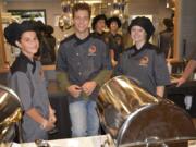 Washougal: Zachariah Schroeder, from left, Michael Gonser and Paige Limbo with Washougal High School’s culinary program at a night celebrating the district’s Career and Technical Education program.