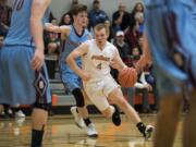 Washougal's Carter Murray (4) drives to the basket during Tuesday night's game against Stevenson in Washougal on Nov. 27, 2018. Washougal won 58-39.