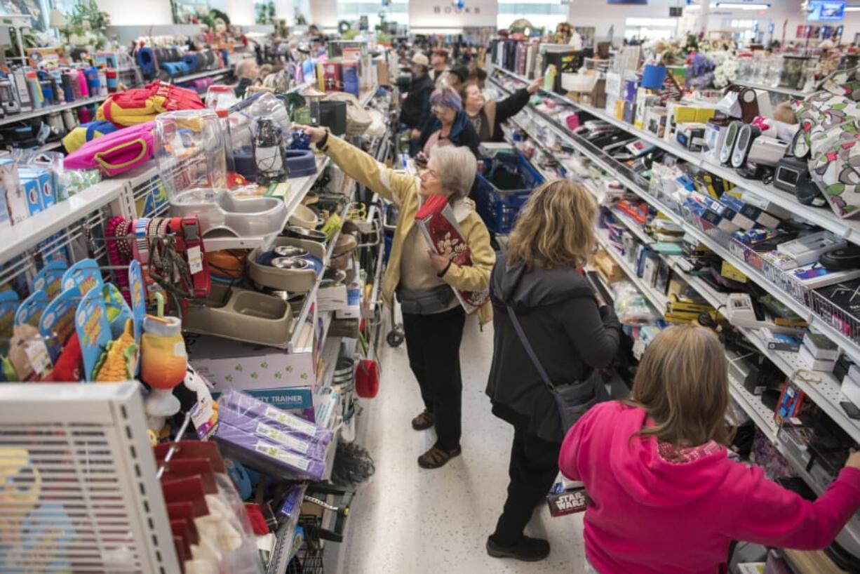 Shoppers pack an aisle of the new Vancouver Goodwill at 14201 N.E. Fourth Plain Blvd. during the grand opening Thursday.