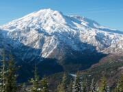 Mount St. Helens is viewed from the east-northeast in January. Commissioners from Cowlitz, Lewis and Skamania counties want the state to study the feasibility of building a road that would more directly connect Mount St. Helens and Mount Rainier.