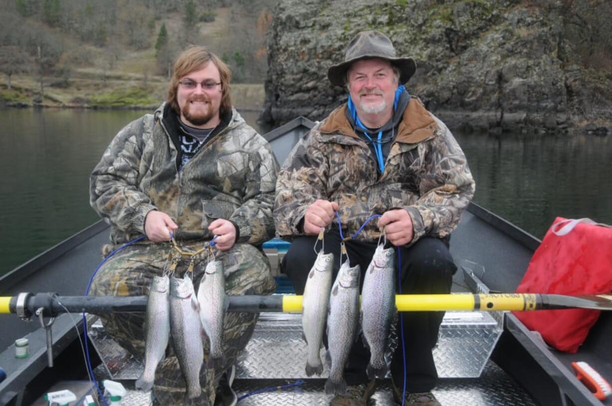 Blake Ramsey (left) and Chris Seassions with a fine mess of Black Friday rainbow trout from Rowland Lake. Why not skip the shopping crowds this Friday and enjoy some trout fishing instead?