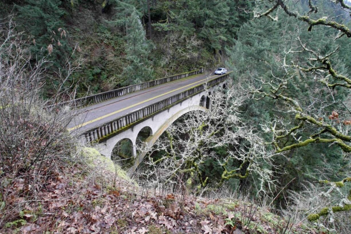 Shepperd’s Dell bridge crosses a small canyon in the Columbia River Gorge near Bridal Veil, Ore., along the Historic Columbia River Highway Tuesday, Jan. 26, 2010. The dell was carved by a creek that includes two fairly substantial tumbling waterfalls. The highway is a winding road amidst lush green trees and cascading waterfalls, overlooks that provide views of the Columbia River.