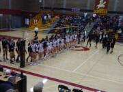 Prairie volleyball players shake hands with their counterparts from Peninsula after Prairie beat the Seahawks 3-1 (Tim Martinez/The Columbian)