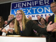 Democrat Jennifer Wexton speaks at her election night party after defeating Rep. Barbara Comstock, R-Va., Tuesday, Nov. 6, 2018, in Dulles, Va.