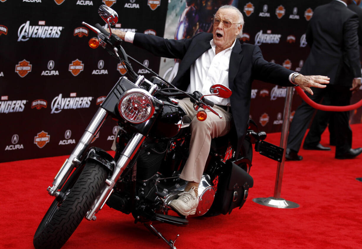 FILE - In this April 11, 2012, file photo,Stan Lee arrives at the premiere of "The Avengers" in Los Angeles. Comic book genius Lee, the architect of the contemporary comic book, has died. He was 95. The creative dynamo who revolutionized the comics by introducing human frailties in superheroes such as Spider-Man, The Fantastic Four and The Incredible Hulk, was declared dead Monday, Nov. 12, 2018, at Cedars-Sinai Medical Center in Los Angeles, according to Kirk Schenck, an attorney for Lee's daughter, J.C. Lee.