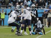 Seattle Seahawks' Sebastian Janikowski (11) celebrates after his game-winning field goal against the Carolina Panthers during the second half of an NFL football game in Charlotte, N.C., Sunday, Nov. 25, 2018.