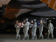 A U.S. Air Force carry team moves a transfer case containing the remains of Staff Sgt. Dylan J. Elchin, Friday, Nov. 30, 2018, at Dover Air Force Base, Del. According to the Department of Defense, Elchin, 25, of Hookstown, Pa., was killed Nov. 27, 2018, by a roadside bomb in Andar, Ghazni Province, Afghanistan.