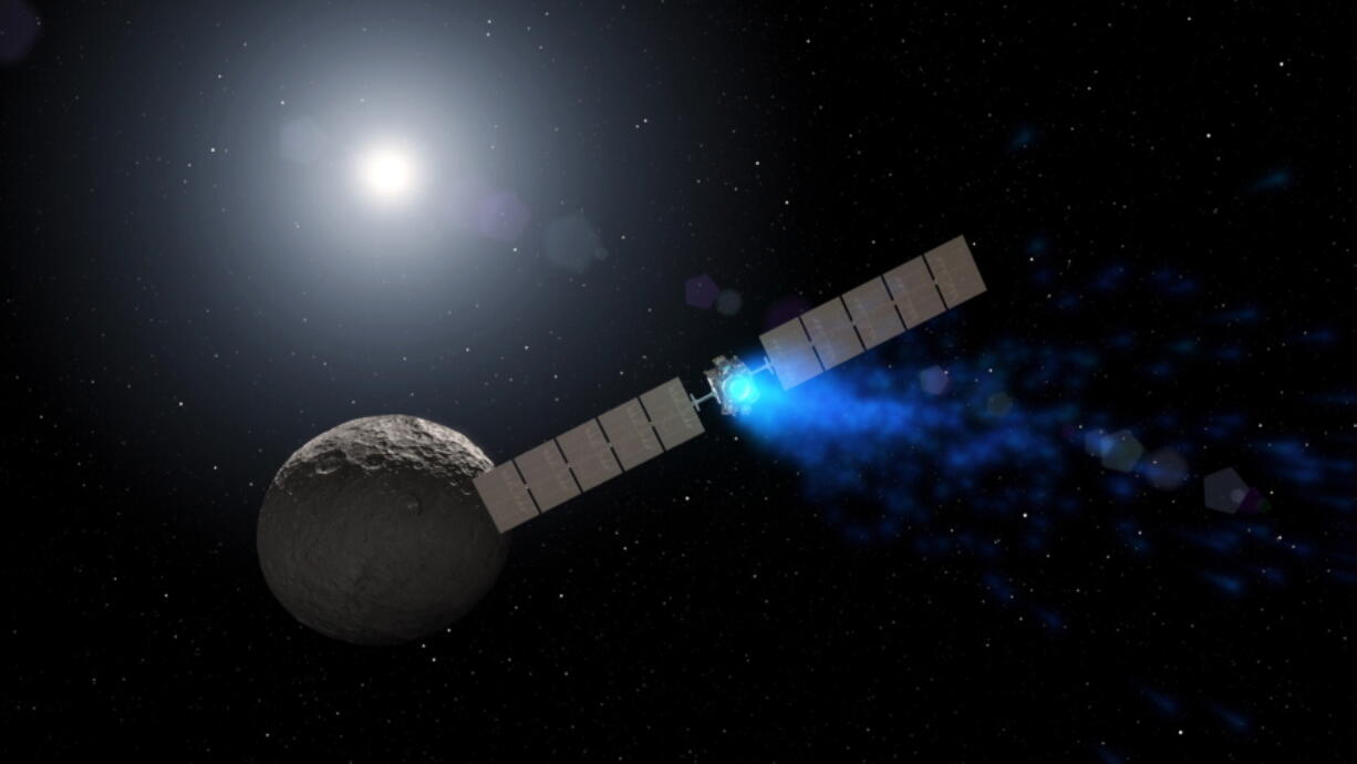 This illustration depicts the Dawn spacecraft orbiting the dwarf planet Ceres. NASA announced Thursday it had lost the probe, ending a fruitful mission in the asteroid belt.