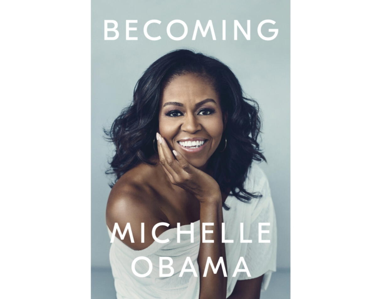 This cover image released by Crown shows “Becoming,” by Michelle Obama. Crown Publishing told The Associated Press on Friday that the former first lady’s memoir had sold more than 725,000 copies after its first day of publication. “Becoming” came out Tuesday, the same day Obama launched a national book tour.