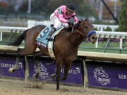 Joel Rosario rides Game Winner to victory in the Breeders’ Cup Juvenile horse race at Churchill Downs, Friday, Nov. 2, 2018, in Louisville, Ky.