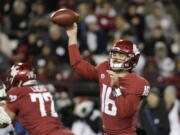 Washington State quarterback Gardner Minshew II (16) throw a pass during the first half of the team’s NCAA college football game against California in Pullman, Wash., Saturday, Nov. 3, 2018.