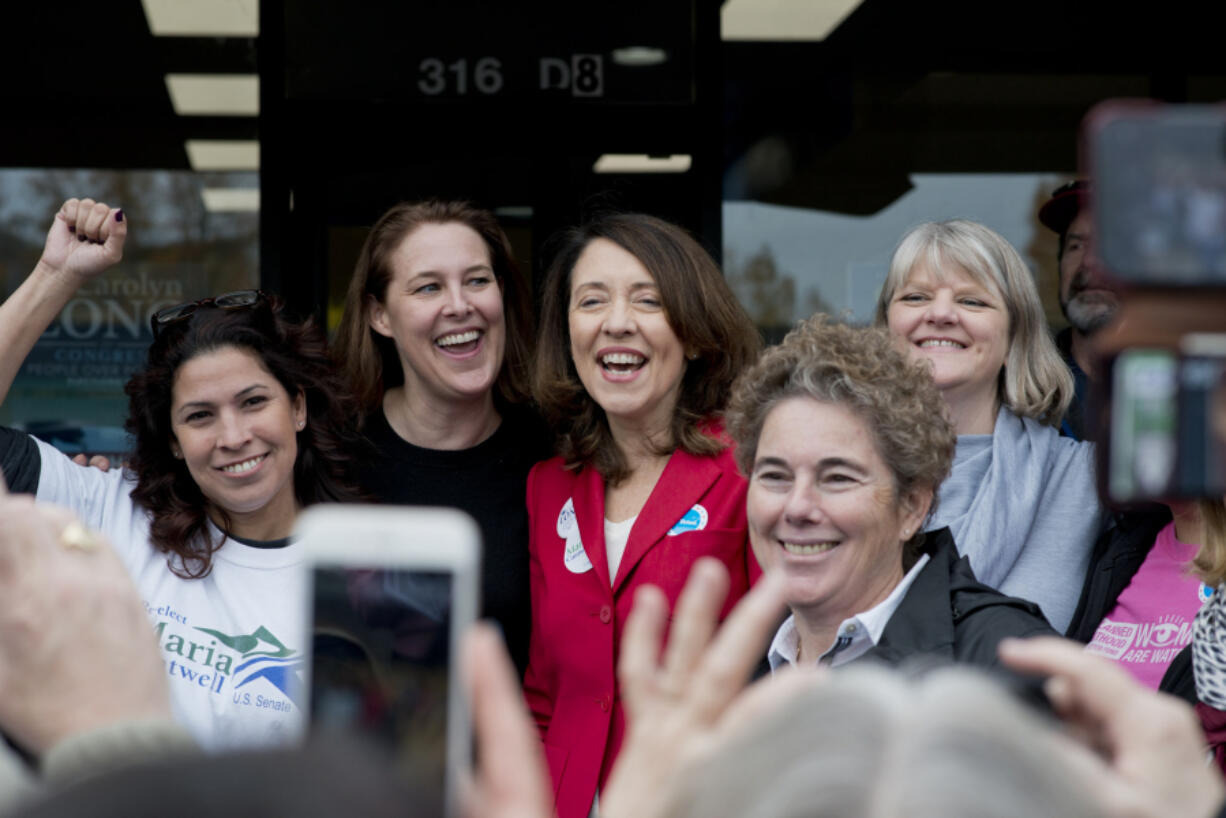 Rep. Monica Stonier, from left, 3rd Congressional District candidate Carolyn Long, Sen. Maria Cantwell, D-Wash., 18th Legislative District candidate Kathy Gillespie and Barbara Melton, who is running for Clark County clerk, attend a Get Out the Vote rally Cantwell hosted Saturday afternoon at Long’s campaign office.