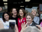 Rep. Monica Stonier, from left, 3rd Congressional District candidate Carolyn Long, Sen. Maria Cantwell, D-Wash., 18th Legislative District candidate Kathy Gillespie and Barbara Melton, who is running for Clark County clerk, attend a Get Out the Vote rally Cantwell hosted Saturday afternoon at Long’s campaign office.