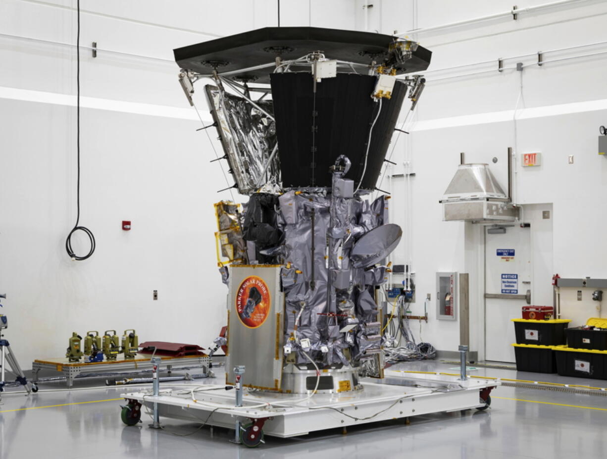 NASA’s Parker Solar Probe sits in a clean room at Astrotech Space Operations in Titusville, Fla., after the installation of its heat shield. Parker has made its first close approach to the sun, just 2 1/2 months after liftoff. The spacecraft flew within 15 million miles (24 million kilometers) of the sun’s surface Monday night, Nov. 5. Its speed topped 213,000 miles (342,000 kilometers) an hour relative to the sun, as it penetrated the outer solar atmosphere, or corona. No spacecraft has ever gotten so close to our star.