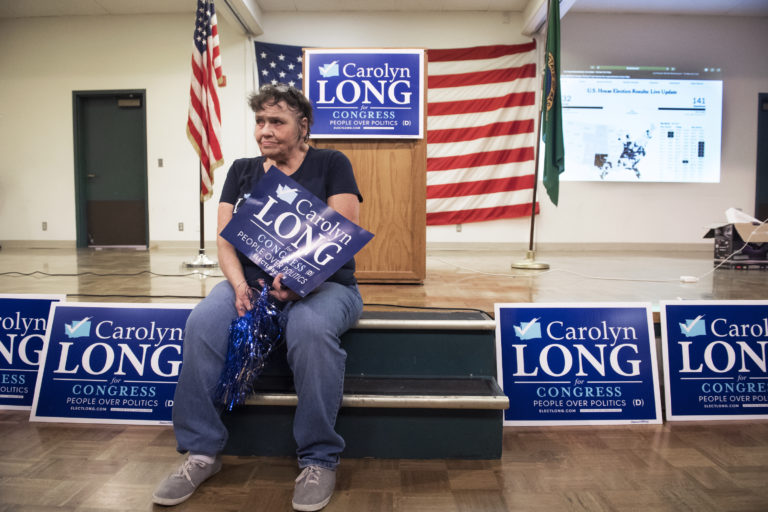 Kathy Dering of Washougal waits for election results while at an election party for Carolyn Long, Democratic candidate for the 3rd Congressional District, at the Luepke Center on Tuesday night, Nov. 6, 2018. "I know she's going to win, I checked my tea leaves... If she loses I guess I'll have to get new tea leaves," Dering said of Carolyn Long.