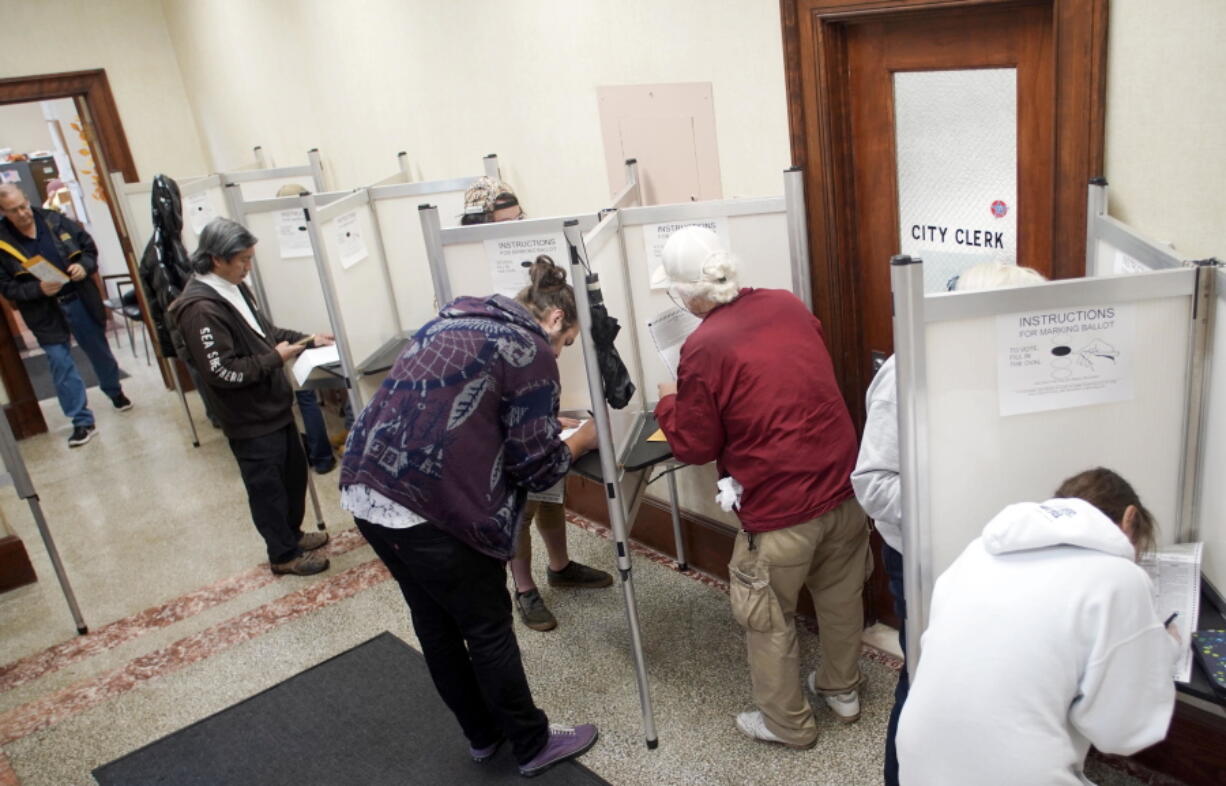 The Pittsfield, Mass., City Hall is packed with voters on the last day of early voting in Massachusetts, Friday, Nov. 2, 2018.