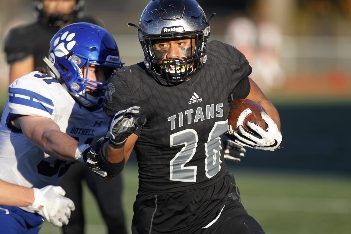 Union running back Joseph Siofele runs the ball against Bothell in the 4A state football quarterfinals.