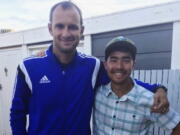 American adventurer John Allen Chau, right, stands for a photograph with Founder of Ubuntu Football Academy Casey Prince, 39, in Cape Town, South Africa, days before he left for in a remote Indian island of North Sentinel Island, where he was killed. Chau, who kayaked to the remote island populated by a tribe known for shooting at outsiders with bows and arrows, has been killed, police said Wednesday, Nov. 21. Officials said they were working with anthropologists to recover the body.