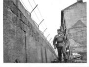 Vancouver’s Harry Daniels, then a lieutenant in the Army, walks past a section of the Berlin Wall some time during his tour in the divided city, from 1960 to 1962.